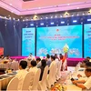 Deputy Minister of Industry and Trade Nguyen Sinh Nhat Tan speaks at the meeting. (Photo: VietnamPlus). 