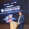Associate Professor Bui Quang Hung, deputy director of the University of Economics HCM City, introduces FinTechNovation Credentials, a collaborative initiative spearheaded by the university and United Overseas Bank (UOB) Vietnam, at an information day held on June 7. (Photo courtesy of UEH)