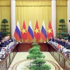 At the talks between Vietnamese President To Lam and his Russian counterpart Vladimir Putin in Hanoi on June 20. (Photo: VNA)