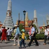 Tourists walk towards Wat Phra Kaeo inside the Grand Palace, which remains one of Thailand’s leading tourist attractions (Photo: Bangkok Post)