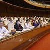 Deputies at the 7th session of the 15th NA (Photo: VNA)