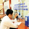 A person registers procedures to set up a business. The use of ID number to carry out business registration procedures can save time to perform administrative procedures. (Photo: tinnhanhchungkhoan.vn)