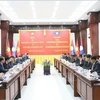 At the talks between Minister of Public Security Sen. Lieut. Gen. Luong Tam Quang and Lao Deputy Prime Minister and Minister of Public Security Gen. Vilay Lakhamphong in Vientiane on July 11. (Photo: VNA)