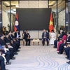 President To Lam meets with Sinlavong Khoutphaythoune, President of the Central Committee of the Lao Front for National Construction (LFNC), in Vientiane on July 11. (Photo: VNA)