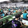 At an apparel factory in Ho Chi Minh City (Photo: VNA)