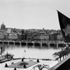 Vietnamese flag flying at the headquarters of the delegation of the Democratic Republic of Vietnam in Geneva, Switzerland), 1954. (File photo: VNA)