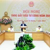 Prime Minister Pham Minh Chinh addresses the conference. (Photo: VNA)