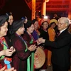 Party General Secretary Nguyen Phu Trong visits and extends New Year wishes to artists in Hanoi on February 15, 2018. (Photo: VNA)