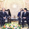Politburo member and permanent member of the Party Central Committee's Secretariat Luong Cuong (right) and Chinese Ambassador to Vietnam Xiong Bo (Photo: VNA)