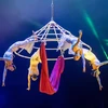 A performance “Du non 4 nu” (four female artists swing on conical hat) of the Vietnam Circus Federation (VCF). (Photo courtesy of Vietnam Circus Federation)