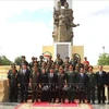 Delegations of the Vietnamese Embassy in Cambodia and the Cambodian Ministry of National Defence take part in the commemorative event at the Vietnam-Cambodia friendship monument in Phnom Penh on July 26. (Photo: VNA) 