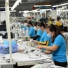 Textile and garment firms have enjoyed a more robust business result on the back of an increase in orders. (Photo: VNA)