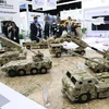 Models of wheeled armoured vehicles are displayed at a defence and security expo in Nonthaburi province in 2022. (Photo: bangkokpost.com) 