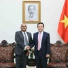 Deputy Prime Minister Tran Luu Quang (R) and ADB Country Director for Vietnam Shantanu Chakraborty. (Photo: VNA)