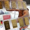 Bao Tin Minh Chau gold bars are displayed for sale in Hanoi. (Photo: VNA)