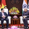 Prime Minister Pham Minh Chinh meets Vice President and Chairman of the Indian Upper House (Rajya Sabha) Jagdeep Dhankhar in New Delhi on August 1. (Photo: VNA)