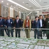 Timor-Leste President Jose Ramos-Horta (5th from right) visits the Vietnam-Singapore Industrial Park in the northern province of Bac Ninh on August 2. (Photo: VNA)