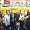 Indian Minister of Culture and Tourism Gajendra Singh Shekhawat (fourth, left) attends the inauguration of Vietnam's booth at IHE 2024. (Photo: VNA)