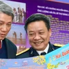 Colonel Nguyen Van Toan, Editor-in-Chief of the Hai Quan Viet Nam (Vietnam Navy) newspaper (R) is confident in the nation's comprehensive development. (Photo: VNA)