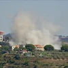 Israel carries out an airstrike on Tayr Harfa, southern Lebanon on July 12. (Photo: Xinhua/VNA)