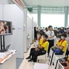 Niigata businesses give consultations to Vinh Long workers and students. (Photo: VNA)