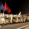 The staff of the Engineering Unit Rotation 1 arrive at Noi Bai Interanational Airport after fulfilling their missions at UNISFA. (Photo: VNA)