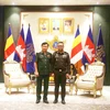 Vietnamese Deputy Defence Minister Sen. Lieut. Gen. Hoang Xuan Chien (L) and Cambodian Deputy Prime Minister and Minister of Defence General Tea Seiha (Photo: VNA)