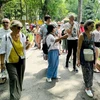 Foreign tourists at President Ho Chi Minh's Vestige in Presidential Palace Area (Photo: nhandan.vn)