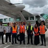 BMKG's Acting Deputy for Weather Modification Tri Handoko Seto (third from left), with airport authorities and flight crew at Aji Pangeran Tumenggung Pranoto Airport, Samarinda on August 9. (Photo: ANTARA)