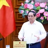 Prime Minister Pham Minh Chinh addresses the meeting. (Photo: VNA)