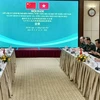 At the talks between the Vietnam Border Guard High Command and the National Immigration Administration of China in Hanoi on August 12. (Photo: VNA)