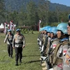 Chief of the Indonesian Police's international relations division, Inspector General Krishna Mukti is inspecting police officers of the Garuda Bhayangkara Corps, who will be deployed for the UN peacekeeping mission in the Central African Republic on October 11. (Photo: Antara)