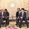 Politburo member and standing member of the Party Central Committee's Secretariat Luong Cuong (R) and Portuguese Communist Party General Secretary Paulo Raimundo at their meeting in Hanoi on August 16. (Photo: VNA)