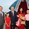 Wang Yi, member of the Political Bureau of the CPC Central Committee, Director of the Office of the CPC Central Committee’s Commission for Foreign Affairs, and Minister of Foreign Affairs (left) welcomes Party General Secretary and State President To Lam and his spouse at the Beijing Capital International Airport on August 18. (Photo: VNA)