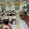 An English lesson at a primary school in Hanoi (Photo: VNA)