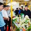 Chi Lang custard apples are introduced at the trade fair. (Photo: VNA)