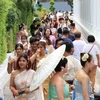 Tourists visit the Temple of Dawn in Bangkok. (Photo: Bangkokpost)