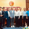 Provincial leaders and Korean Air delegation in Ho Chi Minh City pose for a group photo. (Photo: baobinhdinh.vn)