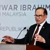 Malaysian Prime Minister Datuk Seri Anwar Ibrahim delivers a speech during a gathering with the Malaysian diaspora in India at the multipurpose hall of the Malaysian High Commission in India on Aug 20, 2024. (Source: Bernama)