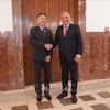 Vietnamese Ambassador to the Czech Republic Duong Hoai Nam (L) and Czech Minister of Industry and Trade Jozef Sikela at their meeting in Prague on August 22 (Photo: VNA)