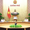 Prime Minister Pham Minh Chinh chairs Government monthly law-making session (Photo: VNA)