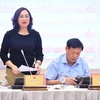 Deputy Minister of Industry and Trade Phan Thi Thang speaks at the meeting. (Photo: VietnamPlus)