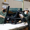 Workers of a foreign-invested firm in Giang Dien Industrial Park in Dong Nai province (Photo: VNA)