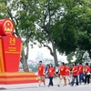 People enjoy the National Day holiday at Hoan Kiem Lake in Hanoi (Photo: VNA)