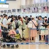 Passengers at Noi Bai International Airport (Photo: VNA)