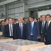 Vietnamese and Lao legislators tour Truong Hai Group Corporation. (Photo: VNA)