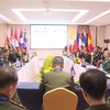 representatives from 10 ASEAN countries as well as Timor-Lester as an observer attend the 21st ASEAN Military Intelligence Meeting (AMIM-21) in Vientiane, Laos. (Photo: VNA broadcasts)