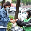 Indonesia–based ride-hailing and delivery service app Gojek has decided to exit Vietnam from September 16 as a step towards focusing its operation in major markets with higher growth potential. (Photo: VNA) 