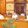 Party General Secretary and President To Lam (middle) speaks at the meeting. (Photo: VNA)