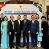 Vietnamese Ambassador to Sweden Tran Van Tuan poses for a group photo with a delegation from Hai Phong city at the Vietnam-Sweden Business Forum 2024 in Stockholm. (Photo: VNA)